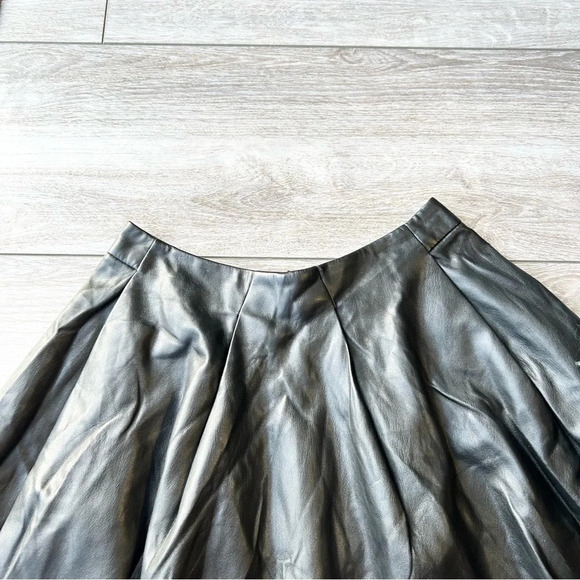 Bebe Black Faux Leather Pleated Mini Circular Skirt - Picture 5 of 10